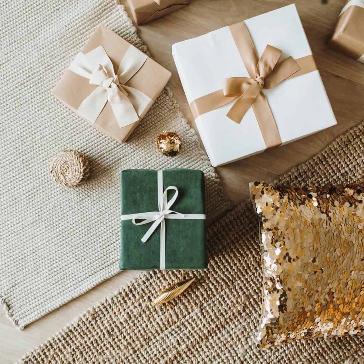 Three gifts on a table.