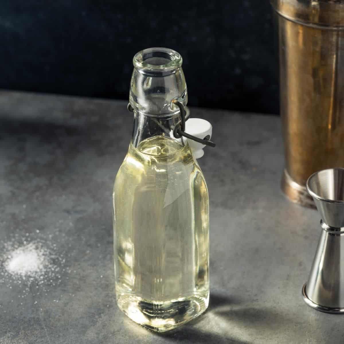 simple syrup in a glass bottle