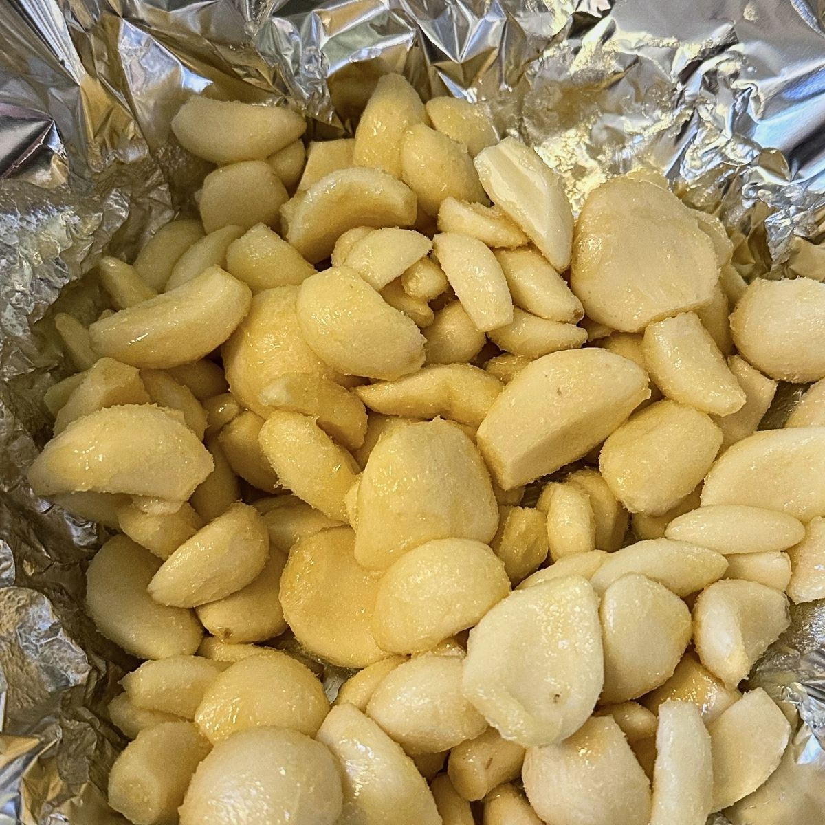Raw peeled garlic tossed in ghee
