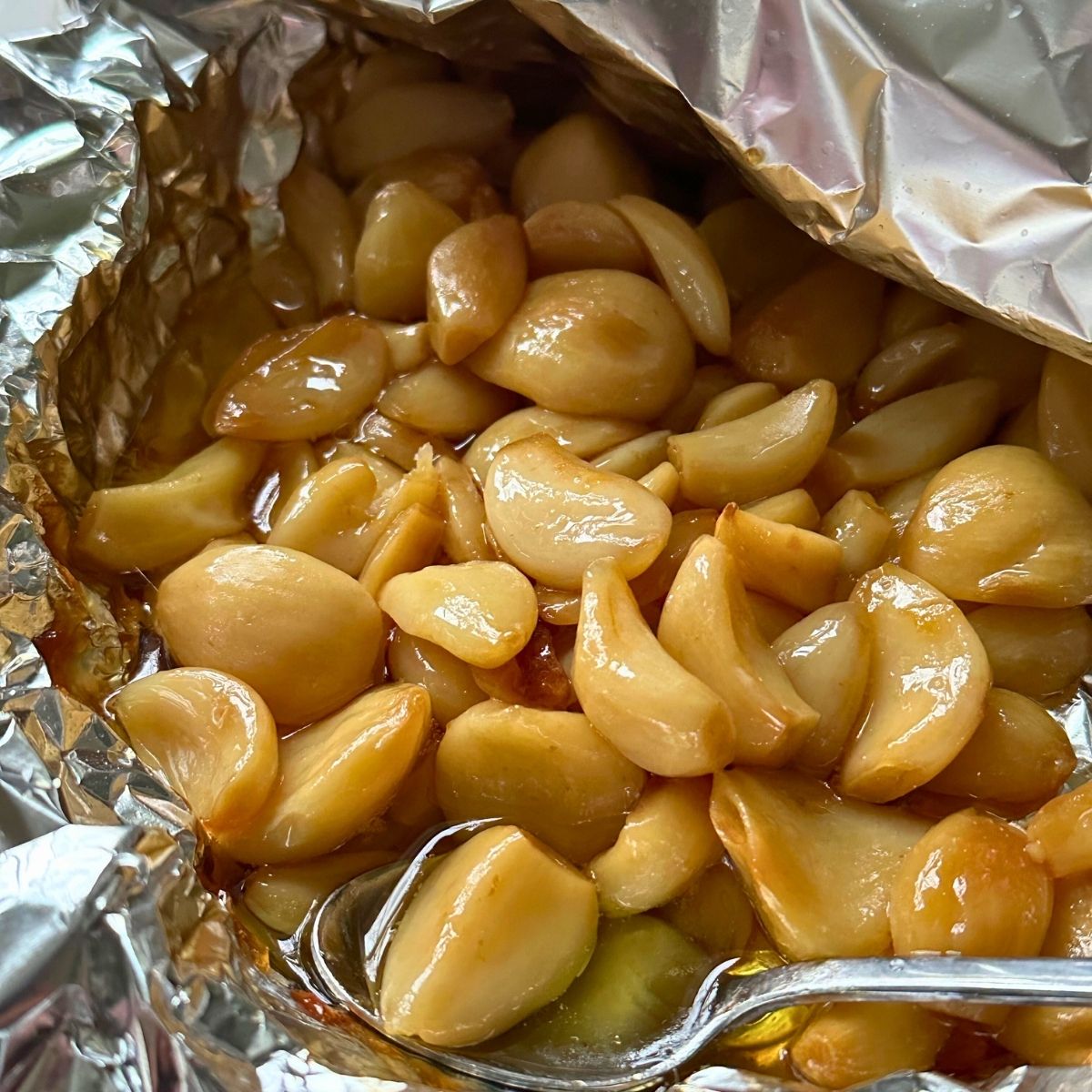 Lighly roasted garlic in foil