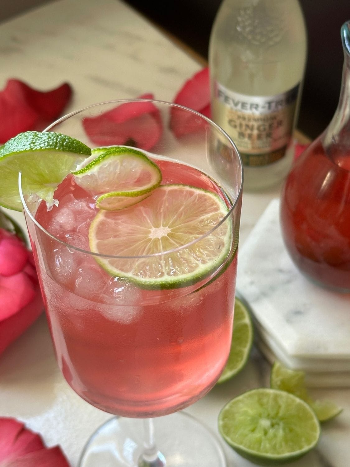 Rose Ginger Lime Non-Alcoholic drink with lime garnish.
