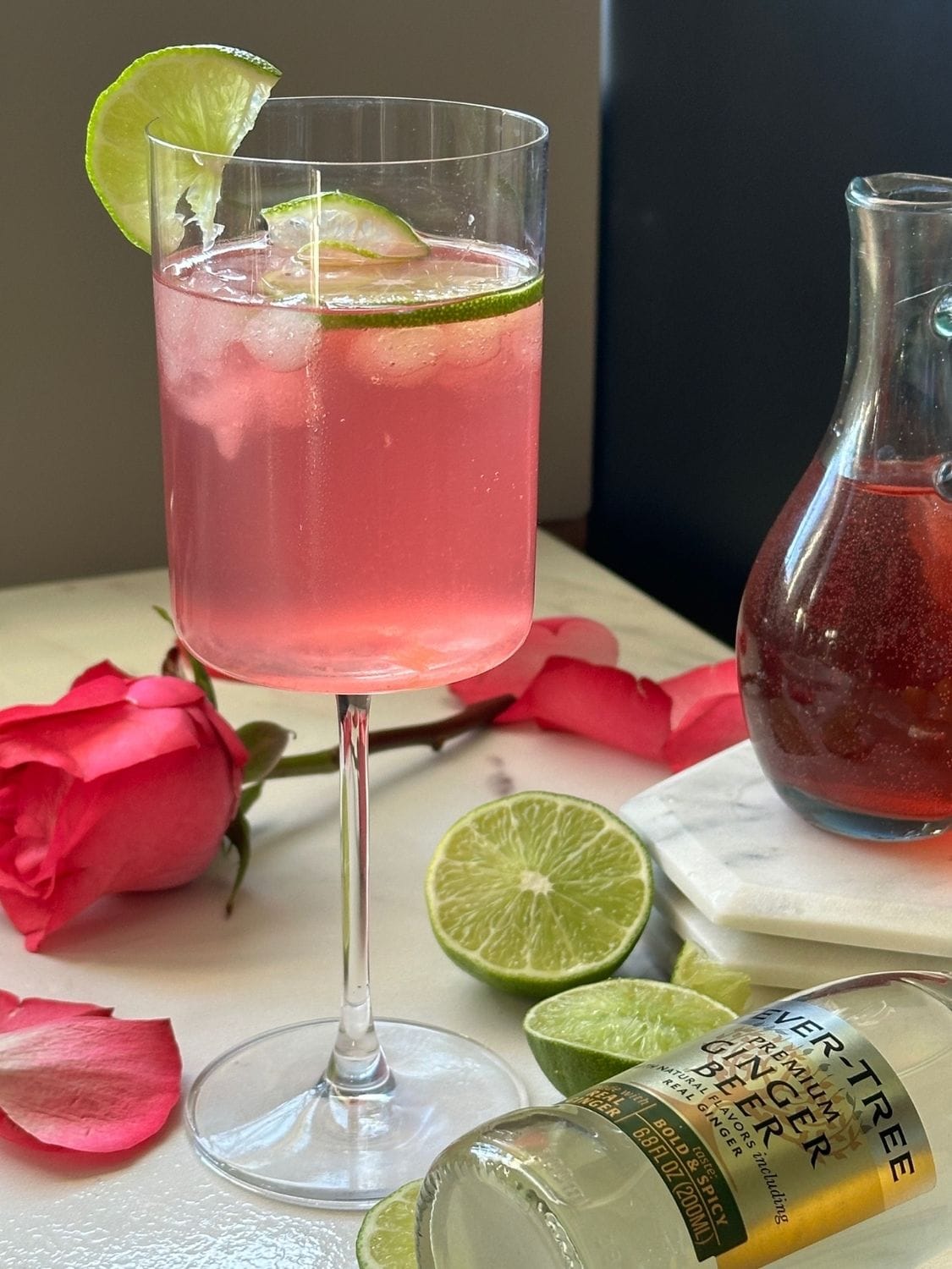 Rose Ginger Lime Non-Alcoholic drink with lime garnish.