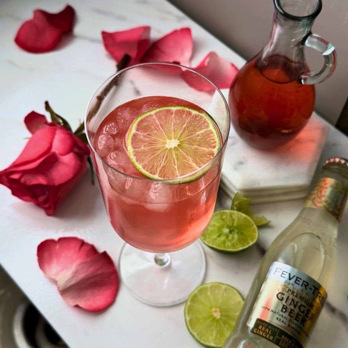 Rose Ginger Lime Non-Alcoholic drink with lime garnish.