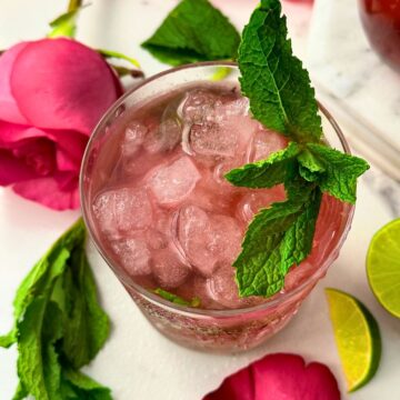 Non-alcoholic Rose Mojito with mint garnish.