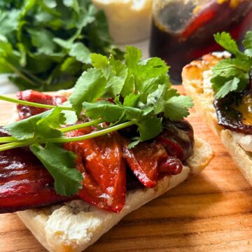 Roasted red pepper sandwich with roasted garlic and goat cheese spread.