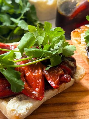 Roasted red pepper sandwich with roasted garlic and goat cheese spread.