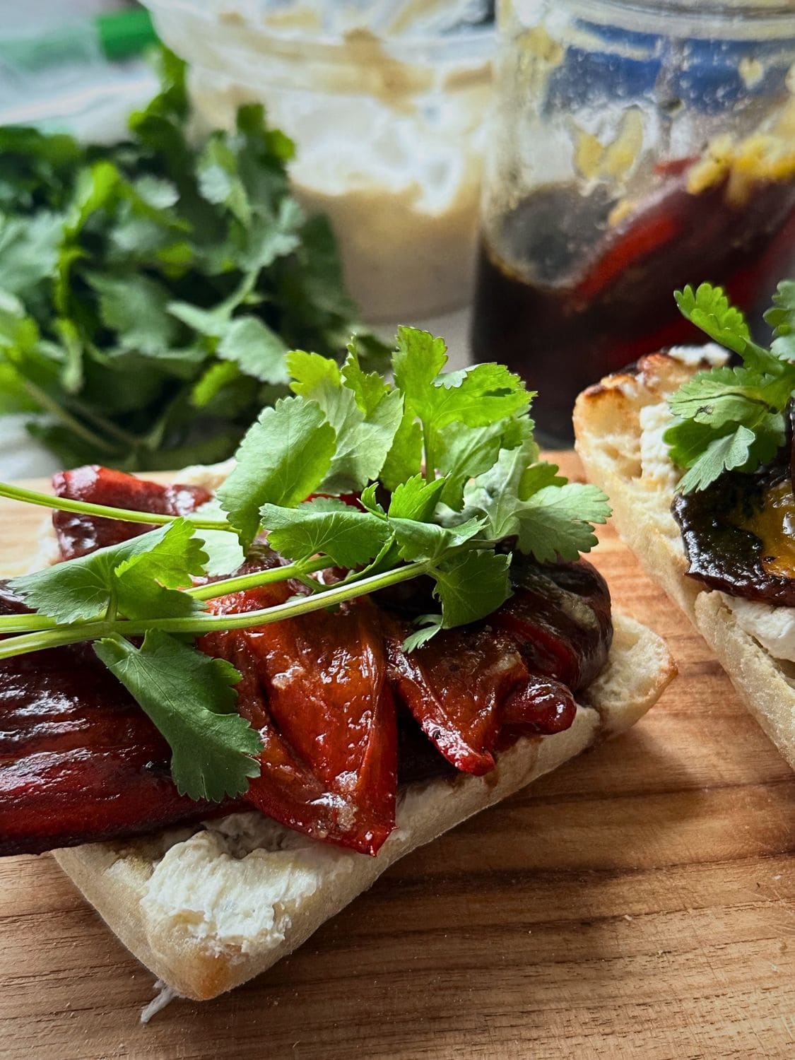 Roasted red pepper sandwich with roasted garlic and goat cheese spread.