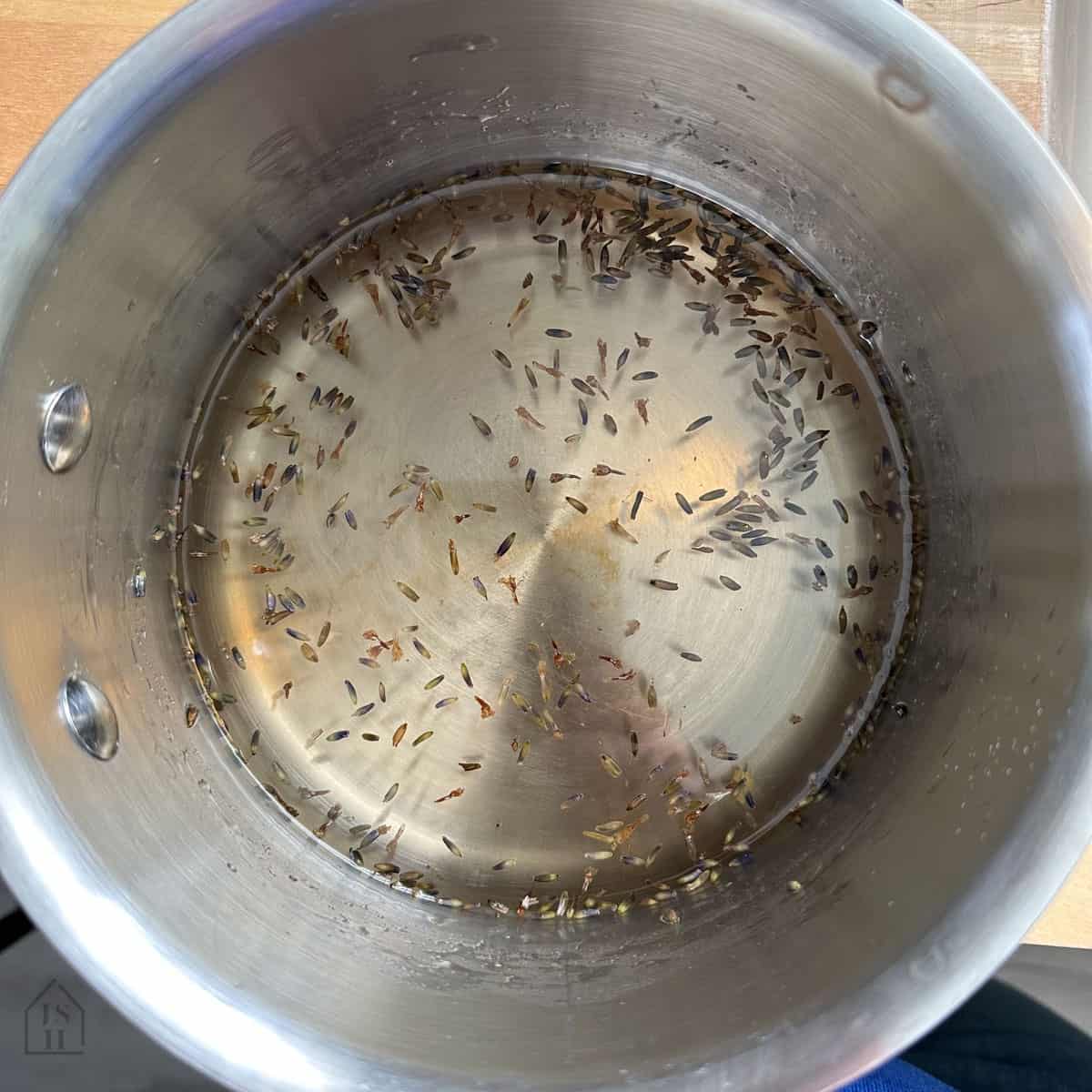 Lavender Simple Syrup in a sauce pot.
