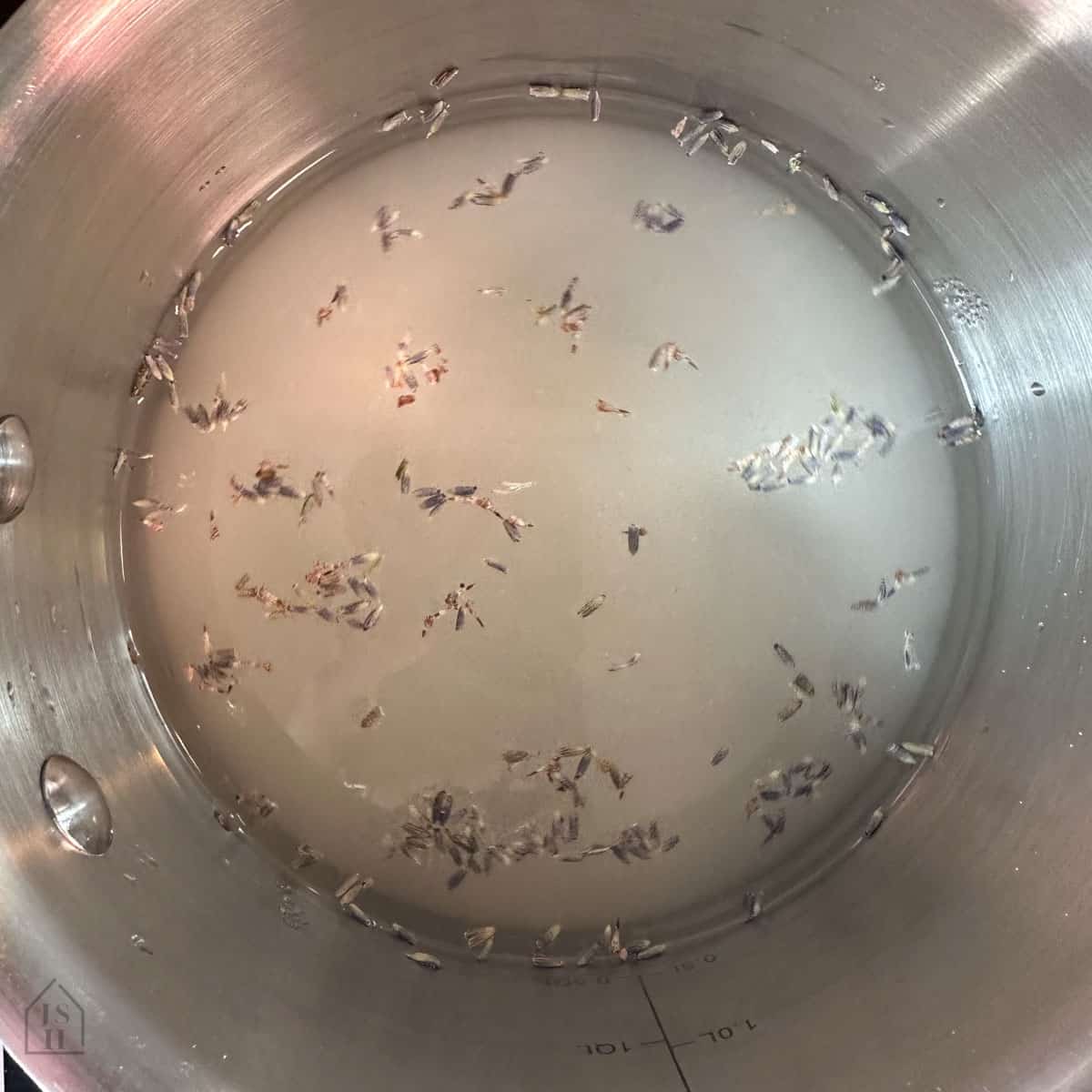 Lavender Simple Syrup in a sauce pot.